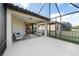 Enjoy this screened patio with view of backyard at 491 Casalino Dr, Nokomis, FL 34275