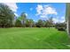 Large backyard with lush landscaping and privacy at 5307 Applegate Ct, Bradenton, FL 34211