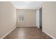 Spacious bedroom with wood-look floors and closet at 5307 Applegate Ct, Bradenton, FL 34211