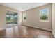 Spacious bonus room with sliding glass doors leading to the patio at 5307 Applegate Ct, Bradenton, FL 34211