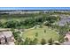 Aerial view of community park with circular green space and walking paths at 5307 Applegate Ct, Bradenton, FL 34211