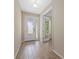 Tile entryway with a view of a glass-paned French door at 5307 Applegate Ct, Bradenton, FL 34211