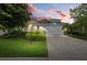 Curb appeal of a charming one-story house with a brick driveway at 5307 Applegate Ct, Bradenton, FL 34211