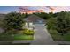 One-story home with a white garage door and landscaped yard at 5307 Applegate Ct, Bradenton, FL 34211