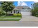 Single-story house with front porch and landscaping at 5307 Applegate Ct, Bradenton, FL 34211