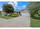Charming house with a brick driveway and lush landscaping at 5307 Applegate Ct, Bradenton, FL 34211