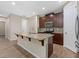Kitchen boasts granite countertops and dark wood cabinets at 5307 Applegate Ct, Bradenton, FL 34211