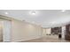 Open living room and kitchen with wood-look floors at 5307 Applegate Ct, Bradenton, FL 34211