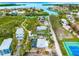 Aerial view showcasing waterfront property and surrounding area at 531 Edlee Ln, Longboat Key, FL 34228