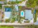Aerial view of a property with two houses and swimming pools at 531 Edlee Ln, Longboat Key, FL 34228