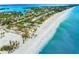 Beachfront properties and tennis court at 531 Edlee Ln, Longboat Key, FL 34228