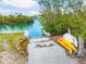 Private boat ramp with kayaks and small boats at 531 Edlee Ln, Longboat Key, FL 34228