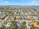 Wide aerial view of waterfront homes and neighborhood at 600 Owl Way, Sarasota, FL 34236