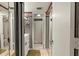 Bathroom with black and white striped wallpaper at 6114 43Rd W St # 104E, Bradenton, FL 34210