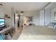 Spacious bedroom with a large bed, ample natural light and views of the exterior at 6114 43Rd W St # 104E, Bradenton, FL 34210