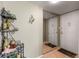 Condo entryway with mirrored closet doors at 6114 43Rd W St # 104E, Bradenton, FL 34210
