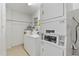 Shared laundry facility with coin-operated washer and dryer at 6114 43Rd W St # 104E, Bradenton, FL 34210
