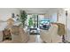 Living room with comfortable seating and a TV at 6114 43Rd W St # 104E, Bradenton, FL 34210