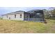 Screened lanai and grassy backyard at 6614 162Nd E Pl, Parrish, FL 34219