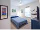 Cozy bedroom with a double bed and tropical decor at 6614 162Nd E Pl, Parrish, FL 34219
