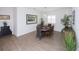 Dining room with wood-look floors and table for six at 6614 162Nd E Pl, Parrish, FL 34219