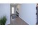 Bright foyer with wood-look flooring and entry door at 6614 162Nd E Pl, Parrish, FL 34219
