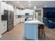 Spacious kitchen with island, stainless steel appliances, and white cabinets at 6614 162Nd E Pl, Parrish, FL 34219