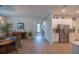 Open kitchen with stainless steel appliances and island at 6614 162Nd E Pl, Parrish, FL 34219