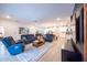 Open living room with a view of the kitchen and backyard at 6614 162Nd E Pl, Parrish, FL 34219