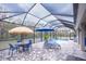 Relaxing pool and patio area with thatched umbrella at 6614 162Nd E Pl, Parrish, FL 34219