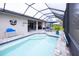 Large screened pool area with plenty of seating at 6614 162Nd E Pl, Parrish, FL 34219