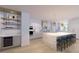Modern kitchen with island, wine cooler, and high-end appliances at 70 Avenida Veneccia # 202, Sarasota, FL 34242