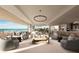 Open concept living space with ocean views and modern furnishings at 70 Avenida Veneccia # 202, Sarasota, FL 34242