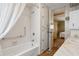 Bathroom with shower tub combination and plenty of cabinet space at 703 Corsica Ct, Bradenton, FL 34207