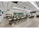 Expansive community hall with tables and chairs set up, offering a versatile venue for gatherings and events at 703 Corsica Ct, Bradenton, FL 34207