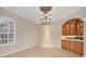 Dining room with built-in hutch and chandelier at 8219 Championship Ct, Lakewood Ranch, FL 34202