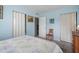 Bedroom with seashell bedding and built-in shelving at 8466 Maureen Ave, North Port, FL 34287