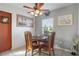 Small dining area with a wooden table and four chairs at 8466 Maureen Ave, North Port, FL 34287
