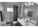 Clean bathroom with shower/tub combo and vanity at 8773 Stone Harbour Loop, Bradenton, FL 34212