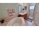 Relaxing bathroom with soaking tub, shower, and updated vanity at 8773 Stone Harbour Loop, Bradenton, FL 34212
