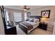 Spacious bedroom with ample natural light and a ceiling fan at 8773 Stone Harbour Loop, Bradenton, FL 34212