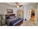 King-size bedroom with access to another room at 8773 Stone Harbour Loop, Bradenton, FL 34212