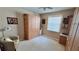 Bedroom with built-in cabinets and workspace at 8773 Stone Harbour Loop, Bradenton, FL 34212