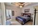 Spacious bedroom with king-size bed and ensuite bathroom at 8773 Stone Harbour Loop, Bradenton, FL 34212