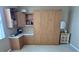 Bedroom with built-in murphy bed and cabinets at 8773 Stone Harbour Loop, Bradenton, FL 34212