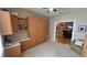 Bedroom with built-in cabinets and view of dining area at 8773 Stone Harbour Loop, Bradenton, FL 34212
