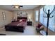 Spacious bedroom with king-size bed and large windows at 8773 Stone Harbour Loop, Bradenton, FL 34212