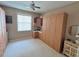 Bedroom with built-in cabinets and workspace at 8773 Stone Harbour Loop, Bradenton, FL 34212