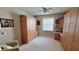 Bedroom with built-in cabinets and workspace at 8773 Stone Harbour Loop, Bradenton, FL 34212