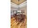 Elegant dining room featuring a wood table and chandelier at 8773 Stone Harbour Loop, Bradenton, FL 34212